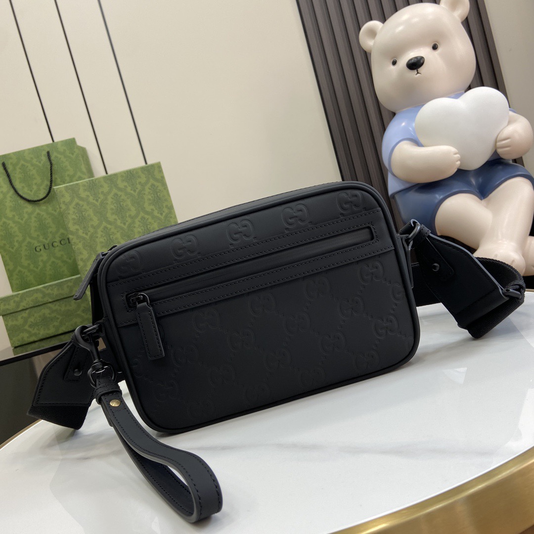 Gvc*1 Crossbody Bags A range of men's bags in black rubber effect leather Model: 771293. Dimensions: 17* 24* 5cm