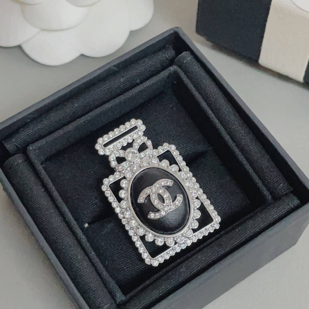 Ch**el lambskin perfume bottle brooch