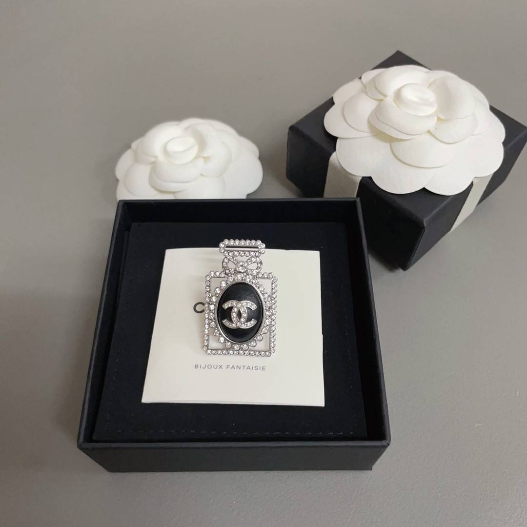 Ch**el lambskin perfume bottle brooch