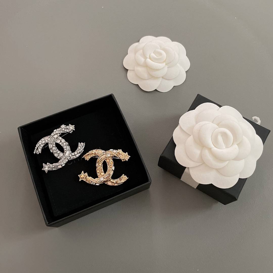 Ch**el brooches